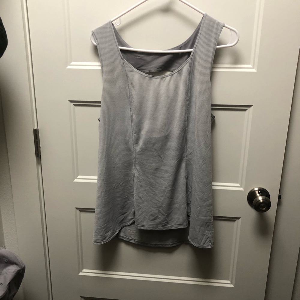 Lululemon sleeveless top. No size marker. Fits like a size 10.